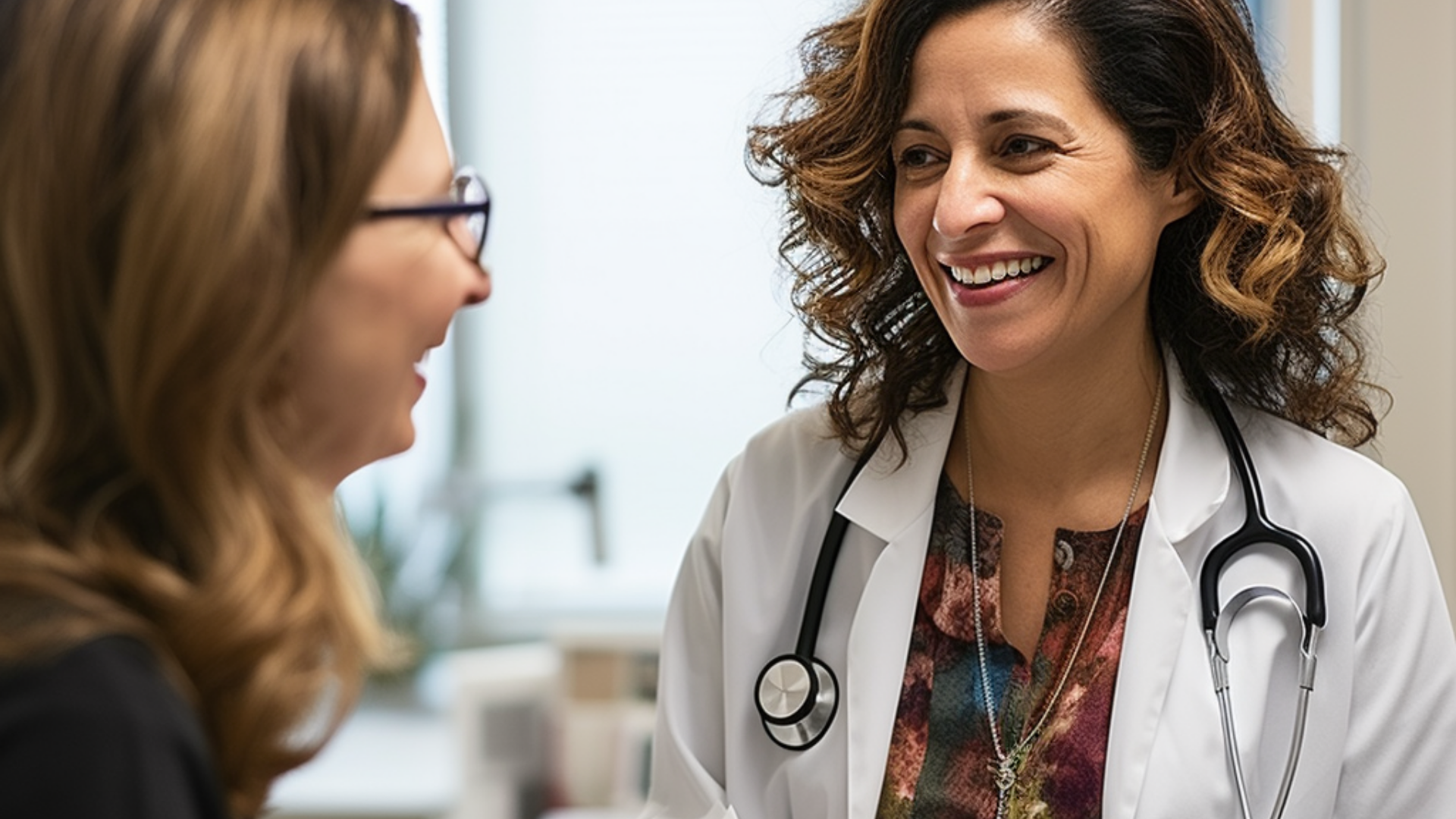 A medical doctor engaged in a conversation with her patient.
