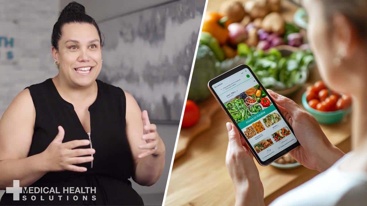 Edgewater clinic staff member assisting a patient during a weight loss consultation