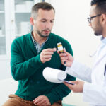 Man during medical consultation for testosterone and weight concerns